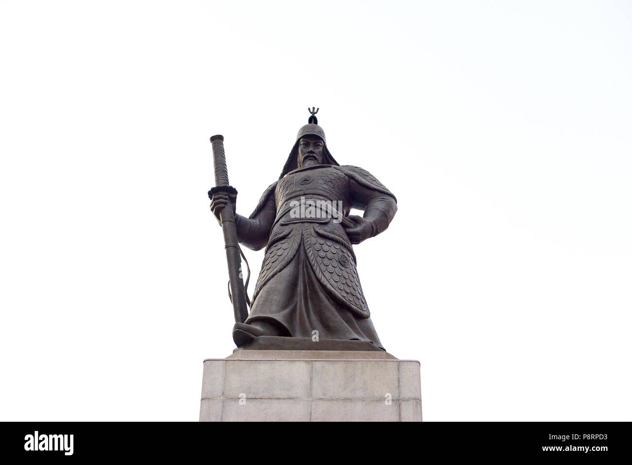 Statue of Admiral Yi Sun-Shin isolated on white background. In Gwanghwamun, Seoul, South Korea. Stock Photo