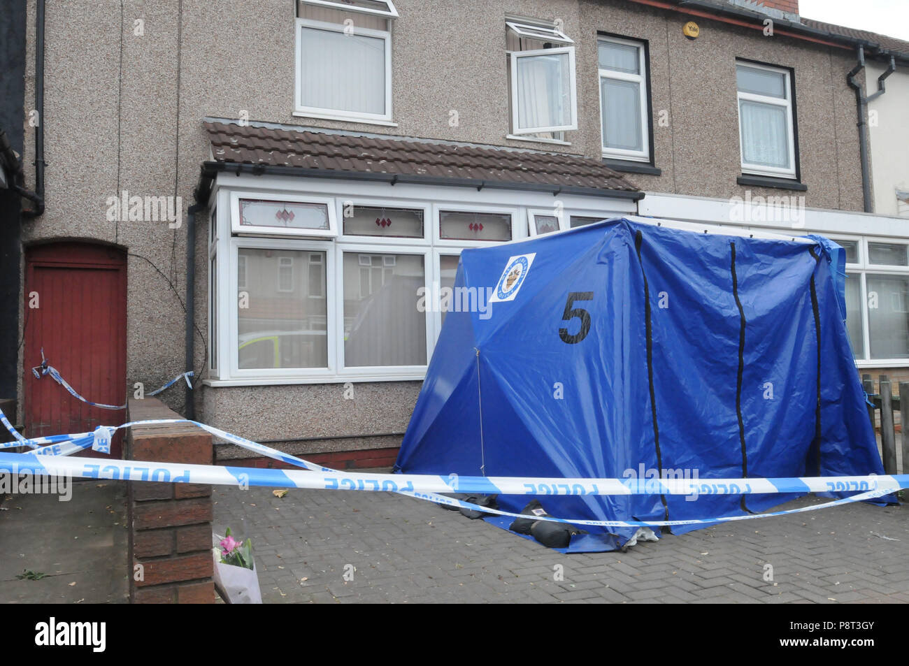Police at a house in Aubrey Road in the Small Heath area of Birmingham