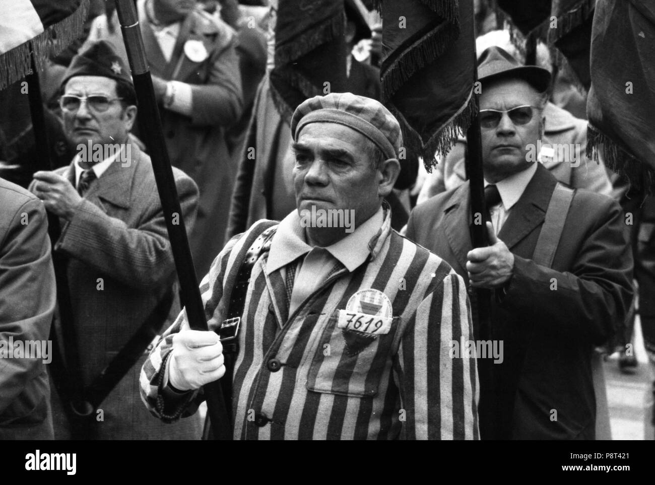 International resistance fighters and persecutees of the Nazi regime, some dressed as inmates of