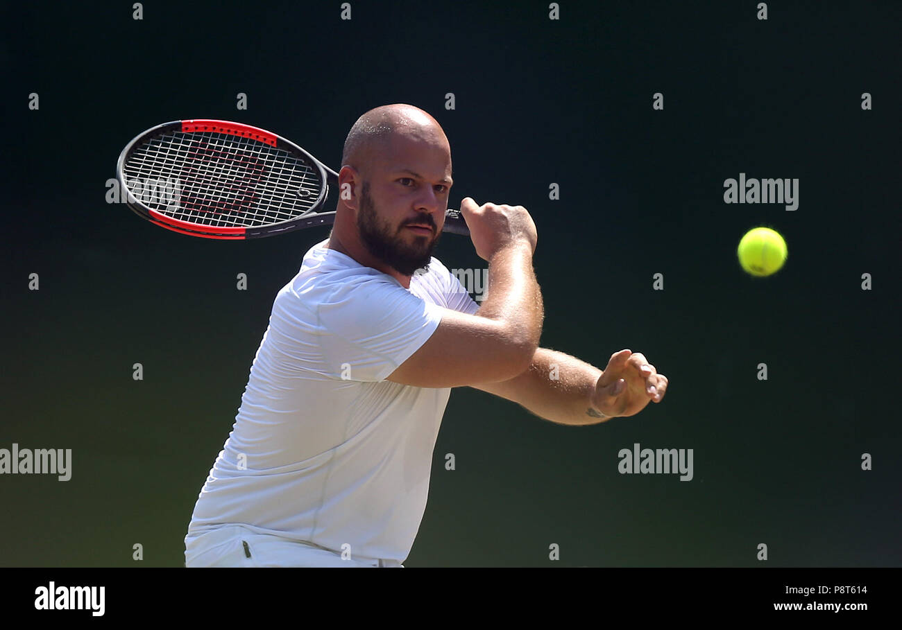 Stefan Olsson in action on day eleven of the Wimbledon Championships at ...