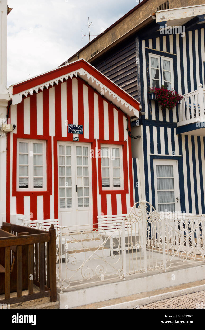 Colourful striped houses at Costa Nova one of the beach areas near Aveiro, Portugal Stock Photo