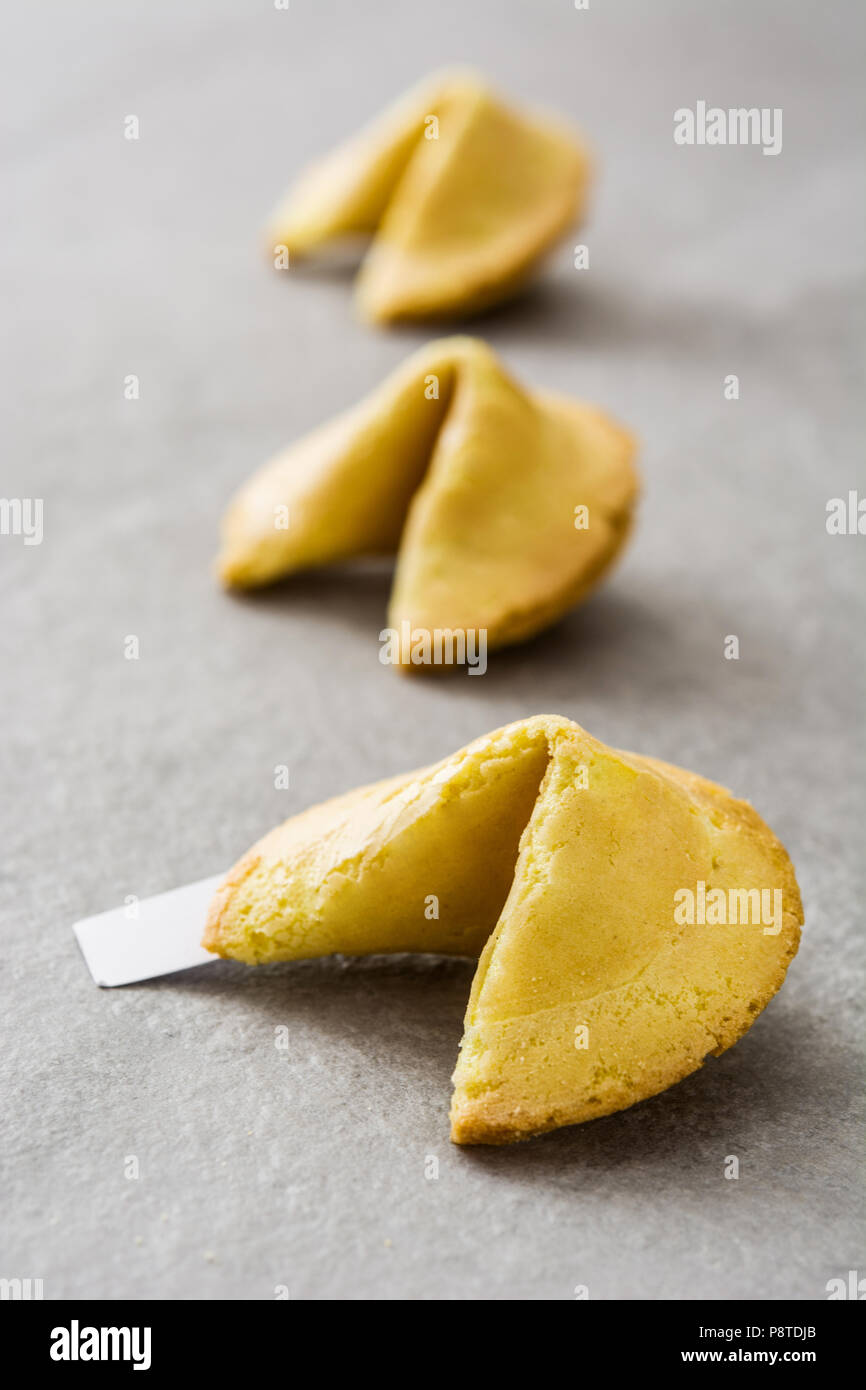 Fortune cookies pattern on gray stone background Stock Photo