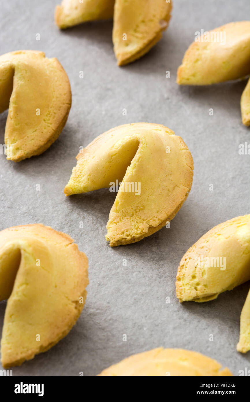 Fortune cookies pattern on gray stone background Stock Photo