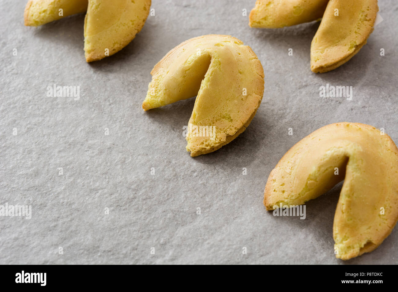 Fortune cookies pattern on gray stone background Stock Photo