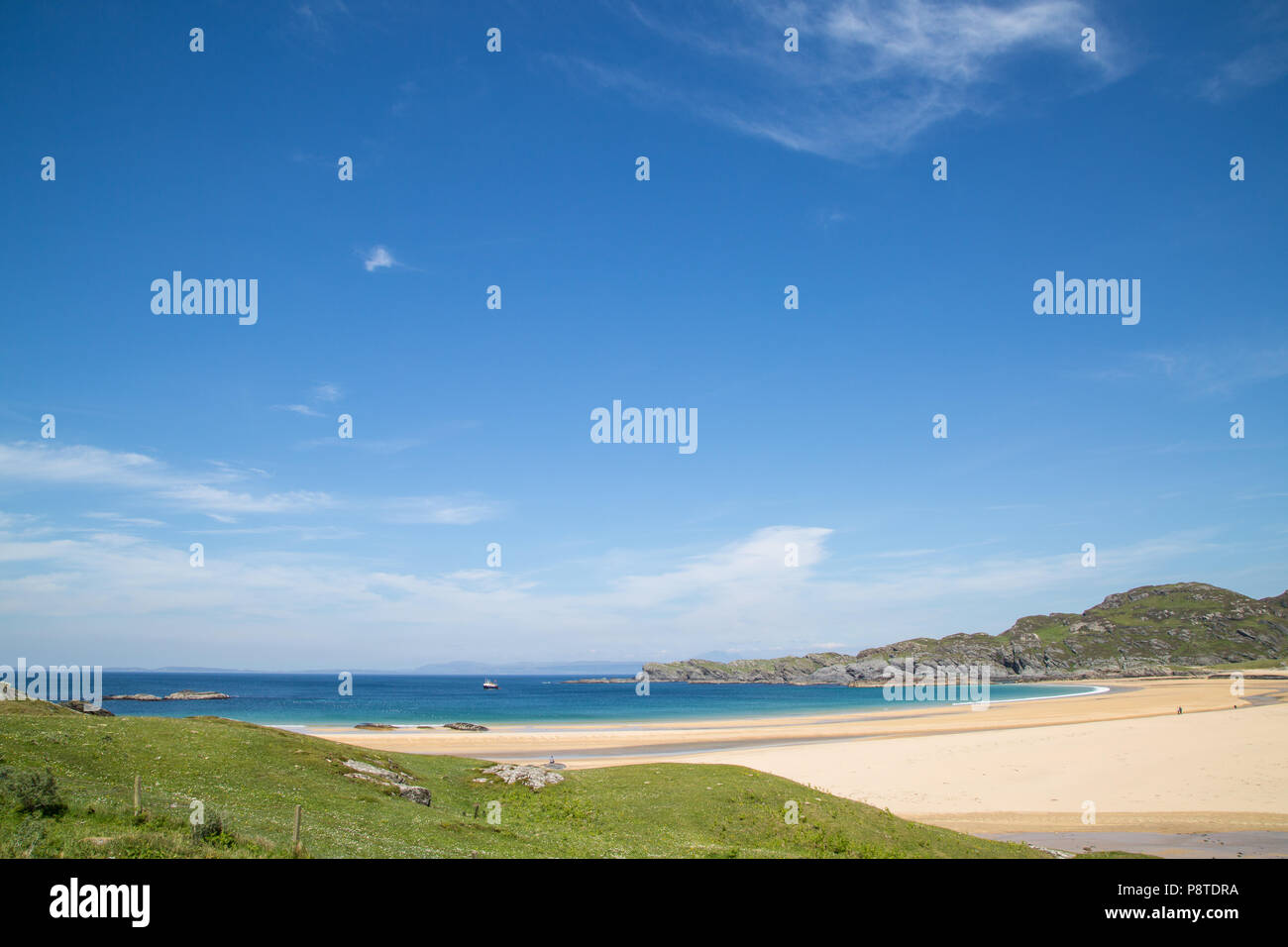 Beautiful empty sandy beach and blue sea, Colonsay, Argyll and Bute, West coast of Scotland Stock Photo