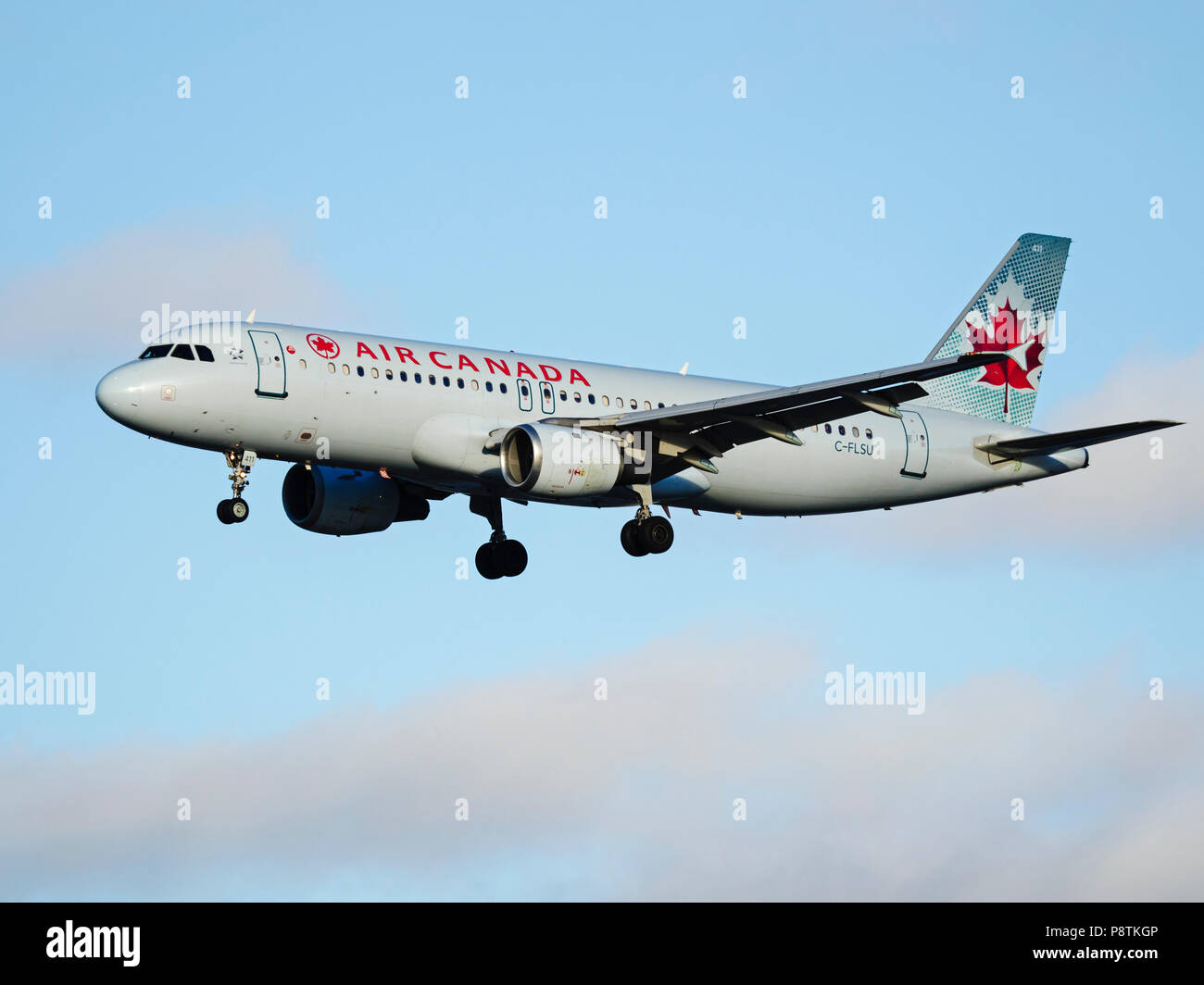 Air Canada plane Airbus A320 single-aisle jet airliner on short final approach for landing at Vancouver International Airport Stock Photo