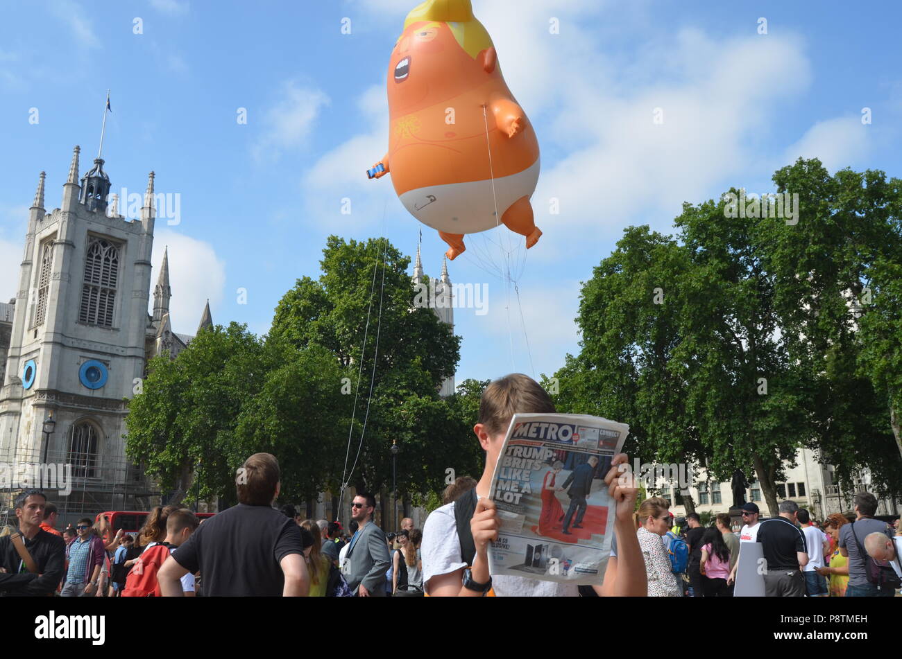 July 13th 2018, Trump Baby Blimp Flies Over Parliament Square in Protest of President Trump's Visit to the UK. Stock Photo