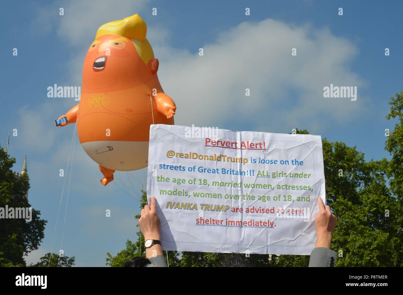 July 13th 2018, Trump Baby Blimp Flies Over Parliament Square in Protest of President Trump's Visit to the UK. Stock Photo