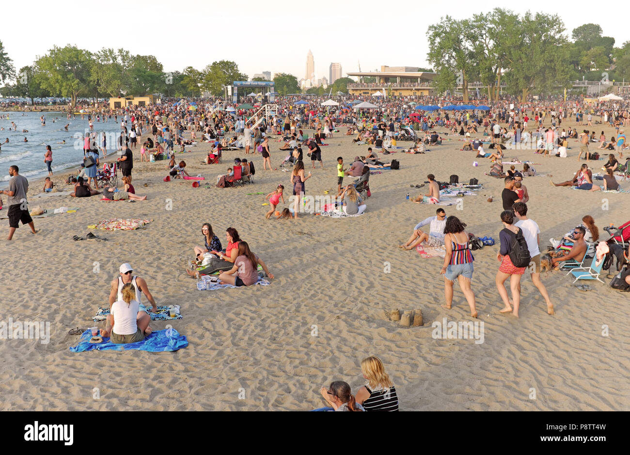 Cleveland, Ohio, USA, 12th July, 2018.  Edgewater Beach attracts beachgoers to the shores of Lake Erie to help deal with the heat and to enjoy a free reggae concert as part of the Edgewater Live music series.  Credit: Mark Kanning/Alamy Live News. Stock Photo