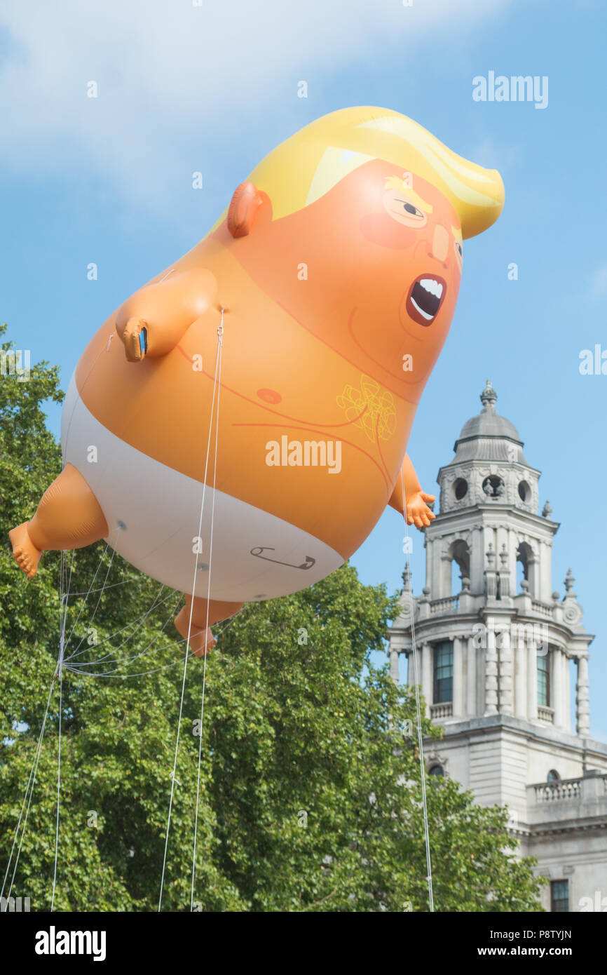 London, UK. 13th July, 2018. Baby Trump blimp floats about Parliament Square Credit: Zefrog/Alamy Live News Stock Photo