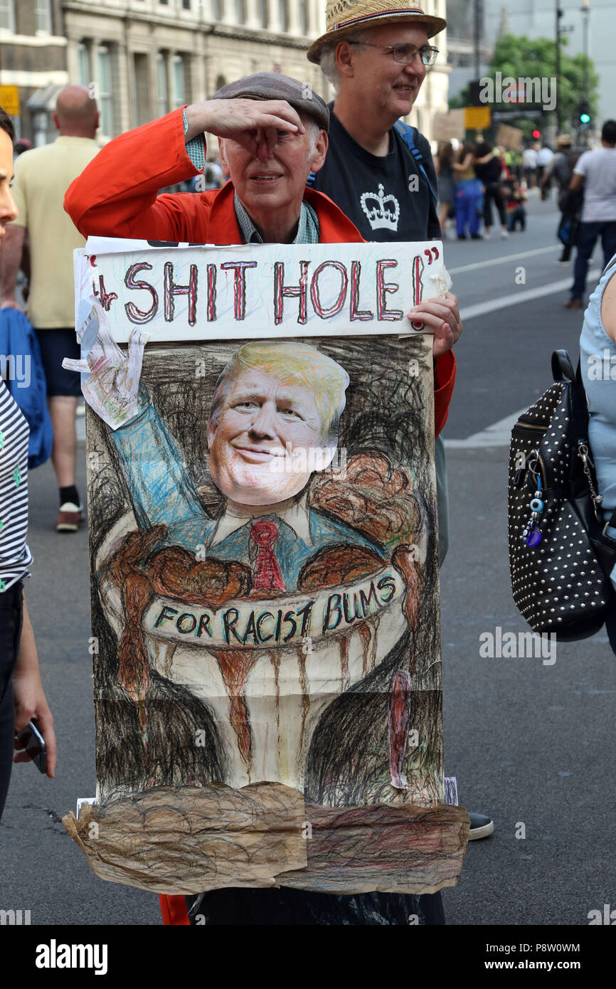 London, UK. 13th July 2018. A man makes his feelings known as a Donald Trump Anti-Trump protest finishes up in Trafalgar Square, London. The President of the United States of America visits London, and has meetings with Prime Minister Theresa May and HM Queen Elizabeth II. Donald Trump Anti-Trump protest, London, on July 13, 2018. Credit: Paul Marriott/Alamy Live News Stock Photo