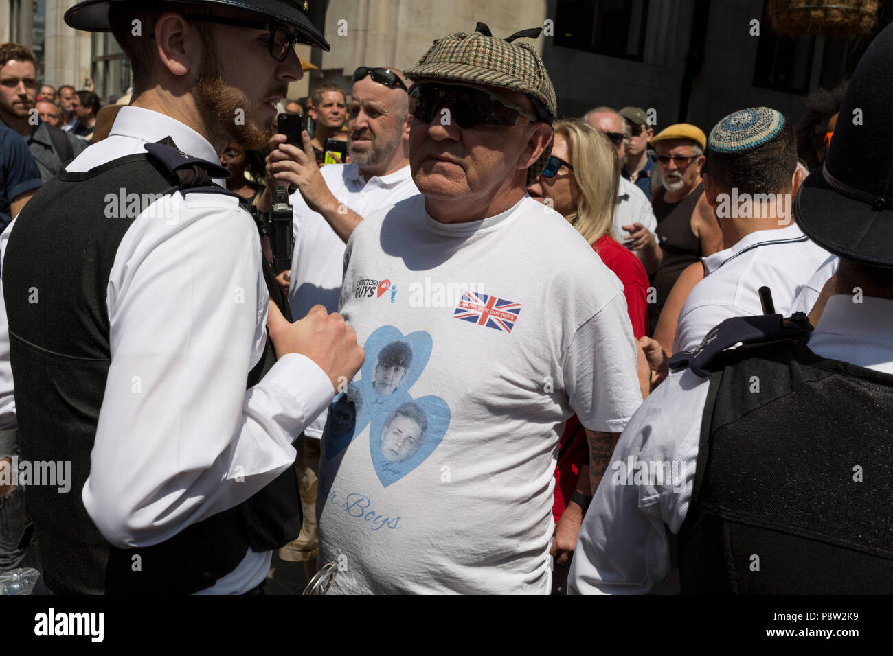 London, UK: Members of the far-right supporters of jailed English Defence Force (EDF) leader Tommy Robinson make a counter-demonstration to those against the visit of US President Donald Trump to the UK, march through central London, on 13th July 2018, in London, England. Photo by Richard Baker / Alamy Live News Stock Photo