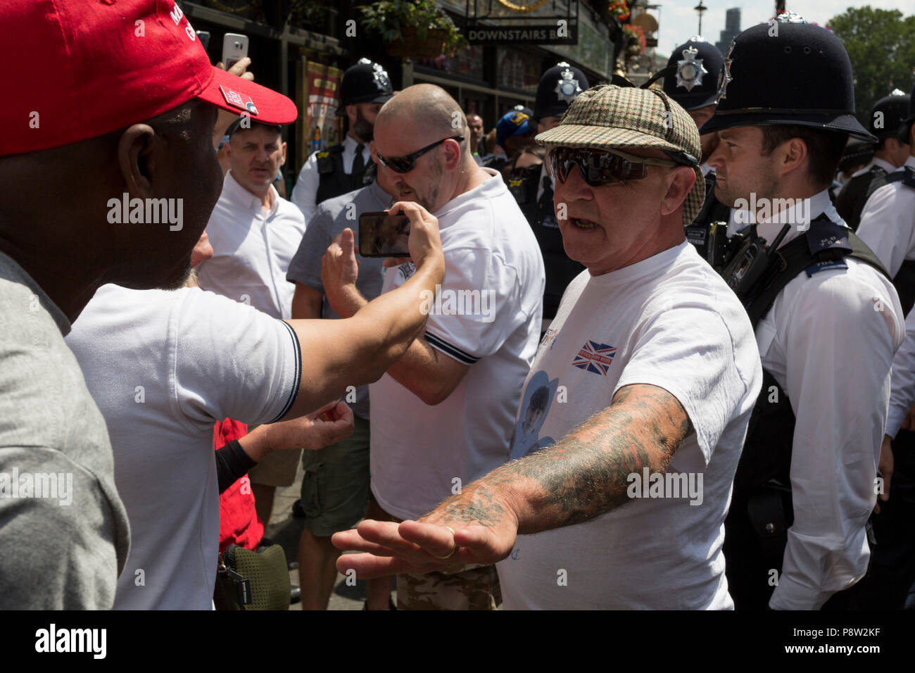 London, UK: Members of the far-right supporters of jailed English Defence Force (EDF) leader Tommy Robinson make a counter-demonstration to those against the visit of US President Donald Trump to the UK, march through central London, on 13th July 2018, in London, England. Photo by Richard Baker / Alamy Live News Stock Photo