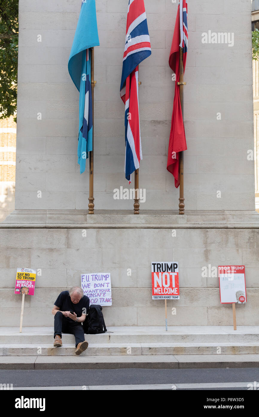 London, UK, 13 July 2018. Anti Trump Placards Placed on the Cenotaph During Anti-Trump Protests in London Credit: Ian Stewart/Alamy Live News Stock Photo