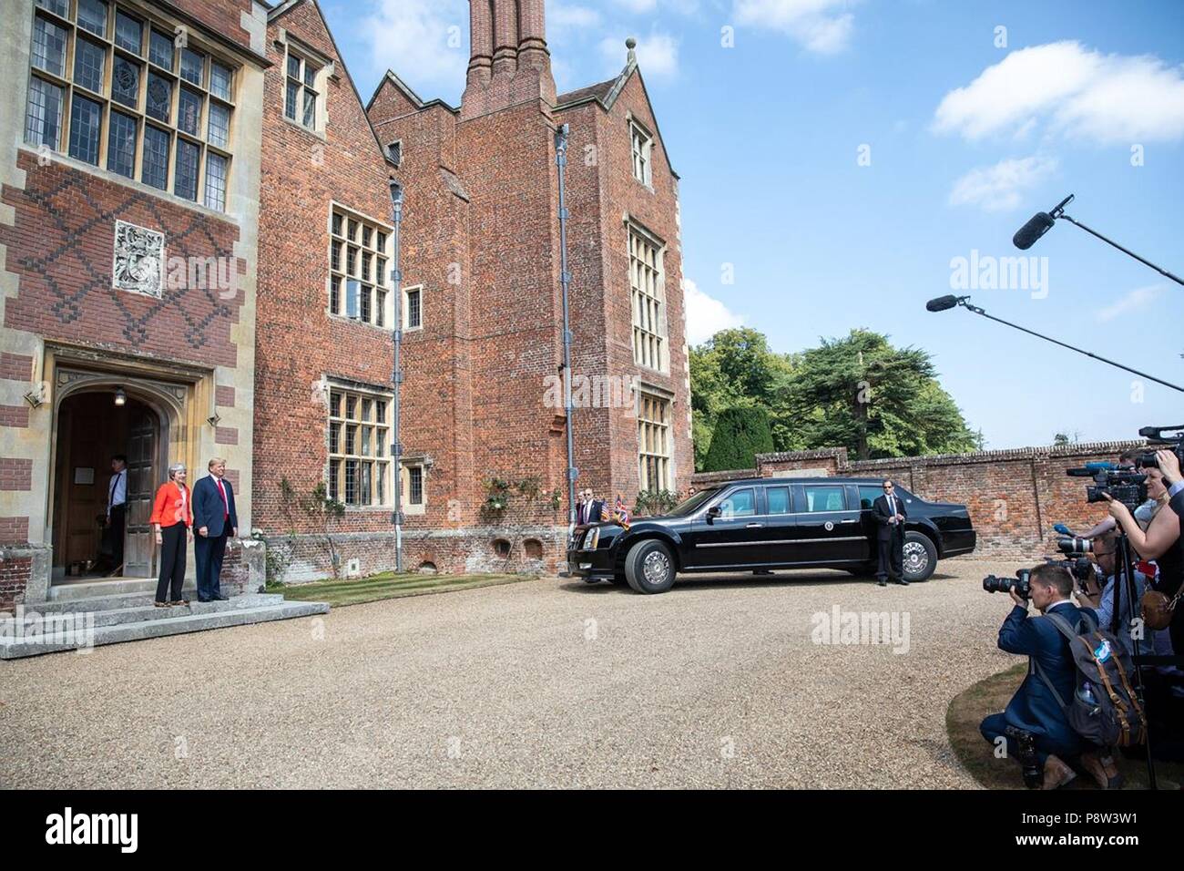 London, UK, 13 July 2018. U.S President Donald Trump is greeted by Prime Minister Theresa May on arrival for bilateral talks at Chequers July 12, 2018 in Buckinghamshire, England. Chequers is the country residence of the Prime Minister. Credit: Planetpix/Alamy Live News Stock Photo