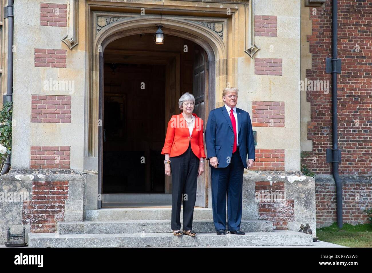 London, UK, 13 July 2018. U.S President Donald Trump and British Prime Minister Theresa May stand for a photo on arrival for bilateral talks at Chequers July 12, 2018 in Buckinghamshire, England. Chequers is the country residence of the Prime Minister. Credit: Planetpix/Alamy Live News Stock Photo