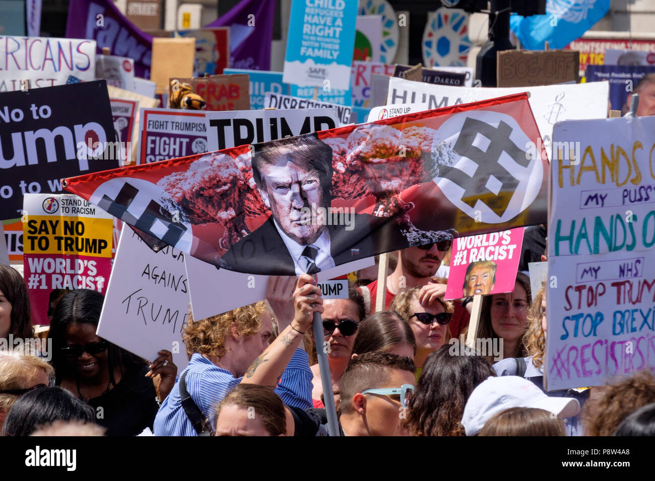 London, UK. 13th July 2018. Tens of thousands of people took to the streets of central London to protest against US President Donald Trump's visit to the UK. Stock Photo