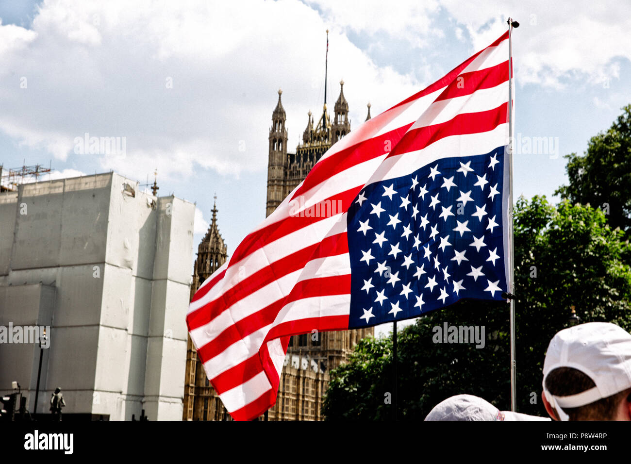 London, UK, 2uly 2018. A US flag is seen flown upside down in front of the UK parliament. Protest by anti-Trump supporters against Donald Trump’s visit to the United Kingdom that took place in central London. Credit: SOPA Images Limited/Alamy Live News Stock Photo