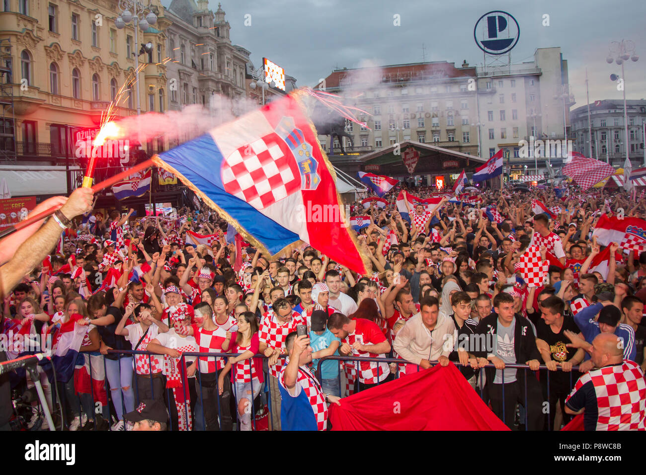 ZAGREB, CROATIA - JULY 11 Croatian football fans on the Ban Jelacic Square, watching 2018 FIFA WORLD CUP RUSSIA match Croatia vs England on July 11, 2 Stock Photo