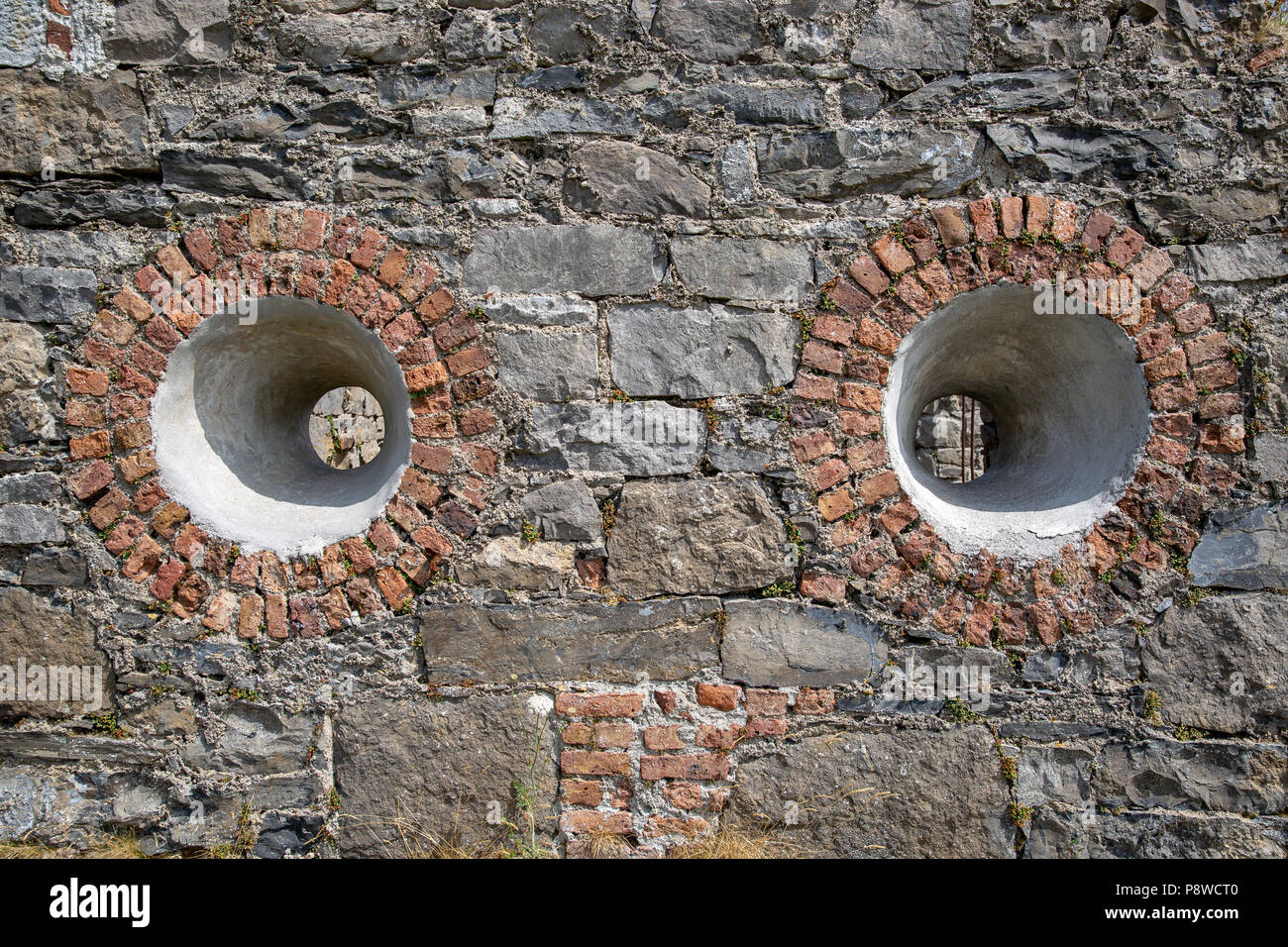 In ruins the Old Watchhouse with circle windows at the Rosses Point used by Sligo River Pilots to watch for sailing ships. Stock Photo