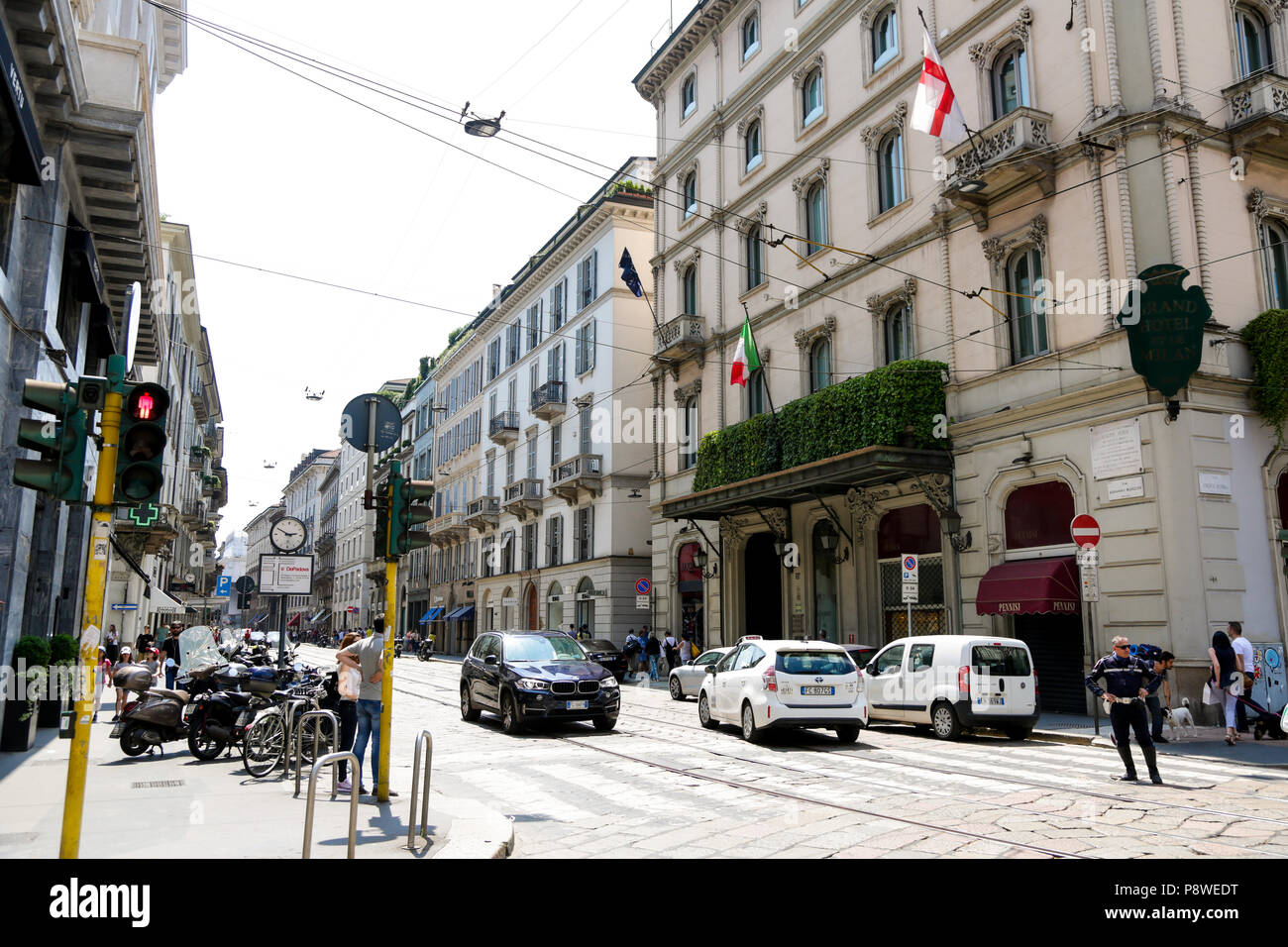 Via Manzoni, Milano: luxury shopping street with most famous fashion  brands, in a sunny day Stock Photo - Alamy