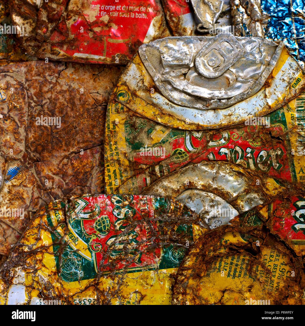 Stack of rusty and used metal beer cans, background image Stock Photo