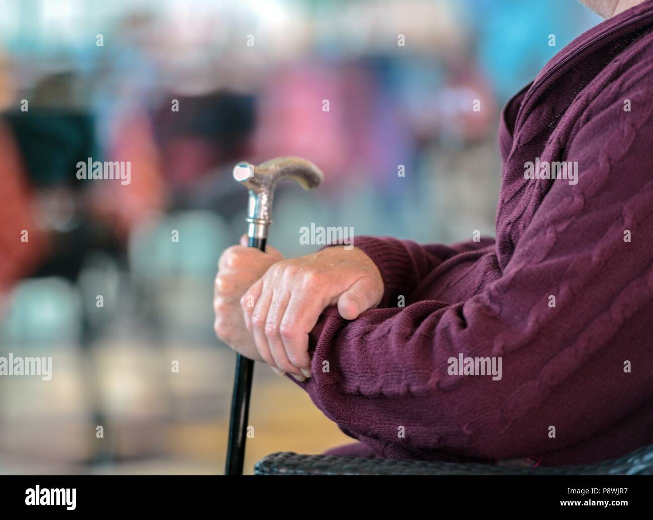 old man holding a walking stick usage worldwide Stock Photo Alamy