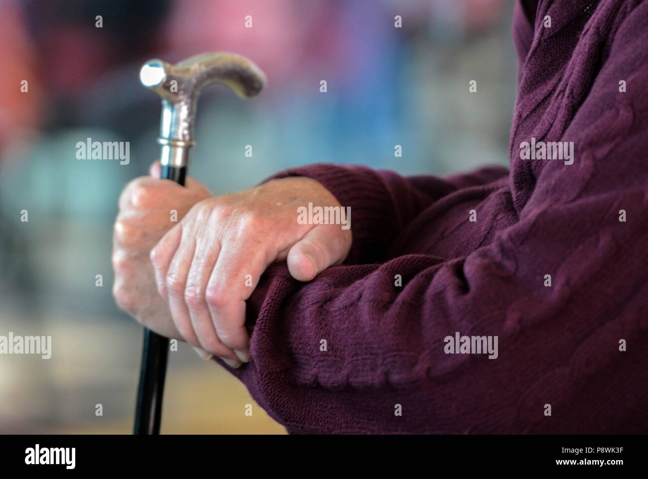 old man holding a walking stick usage worldwide Stock Photo Alamy