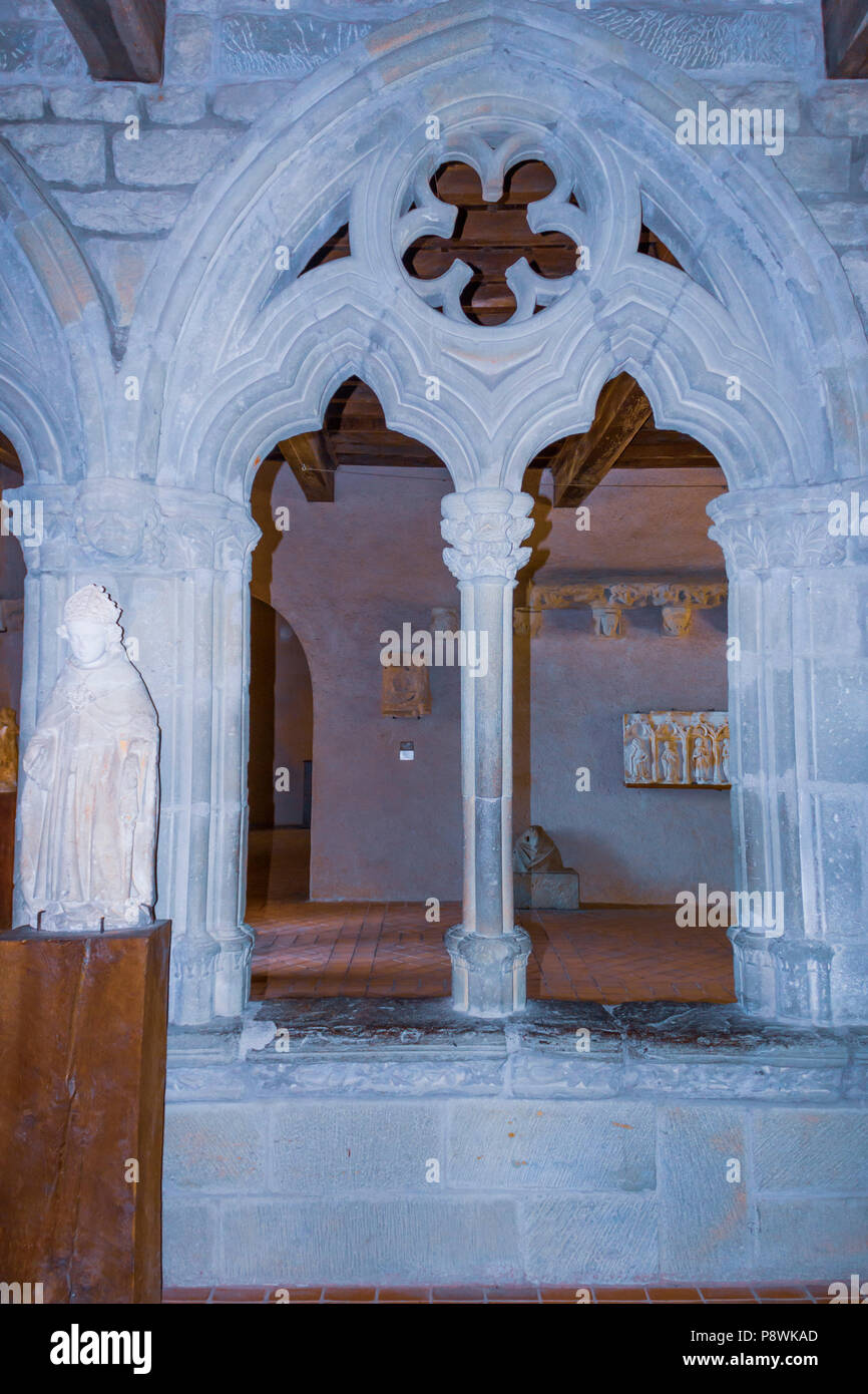 The medieval Cité of Carcassonne, French department of Aude, Occitanie Region, France.  The Salle des arcades inside La Chateau Comtal,  the windows t Stock Photo