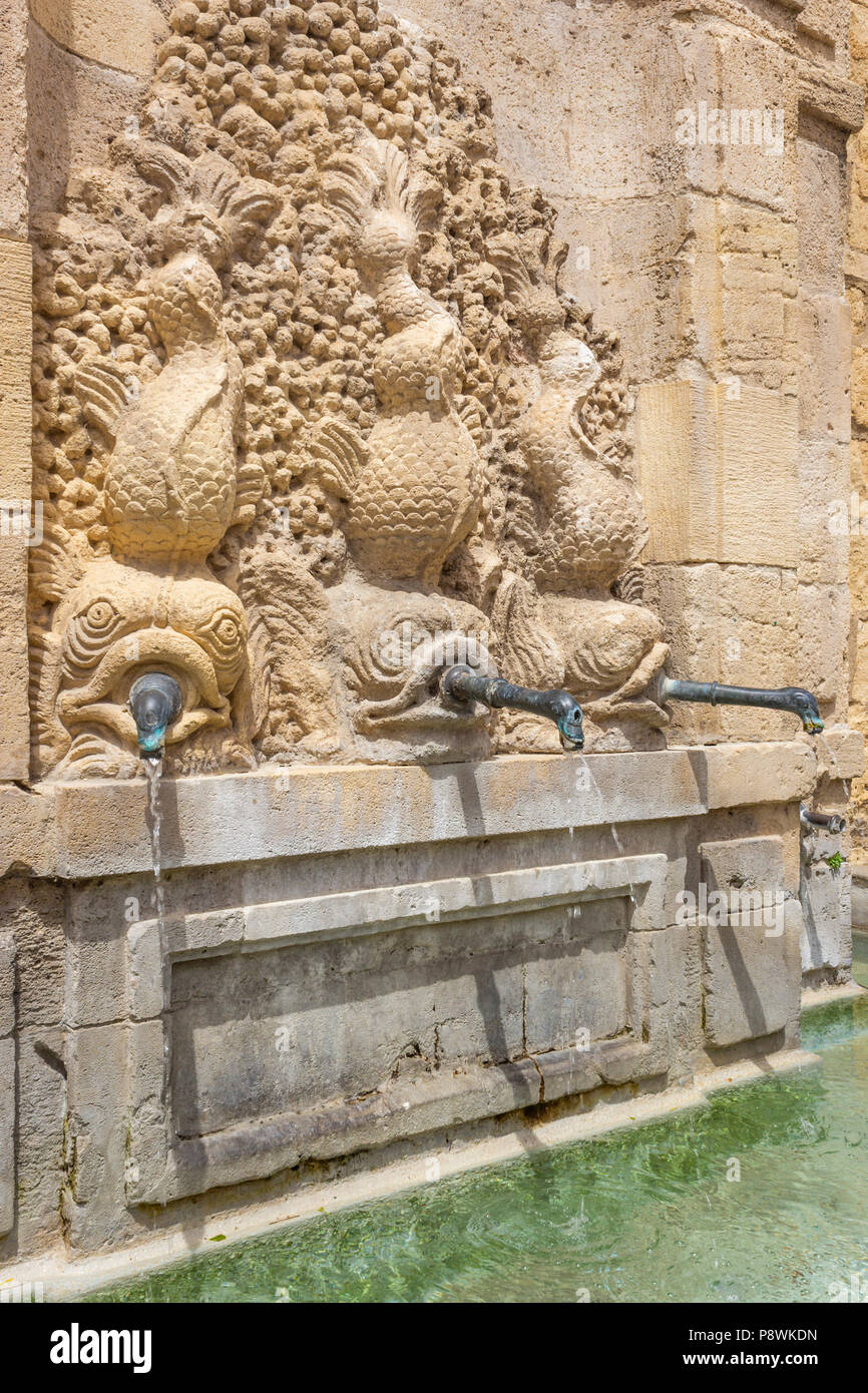 Narbonne; Occitanie Region; France. St Just And St Pasteur Cathedral.; Cathédrale Saint-Just-et-Saint-Pasteur de Narbonne. Detail of fountain on exter Stock Photo