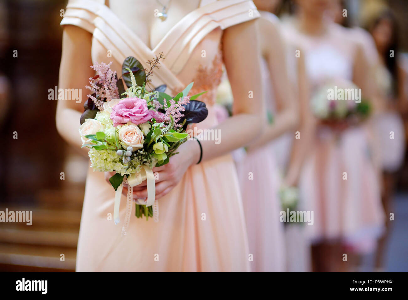 Row bridesmaids bouquets wedding hi-res stock photography and images ...