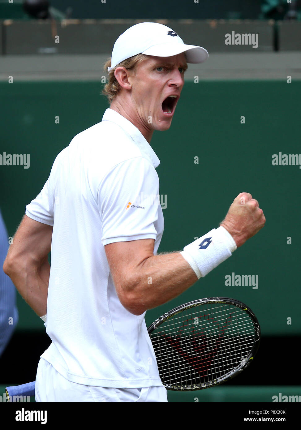 Kevin Anderson reacts on day eleven of the Wimbledon Championships at the All England Lawn Tennis and Croquet Club, Wimbledon. Stock Photo