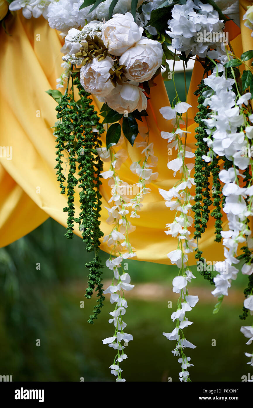 Arch For Wedding Ceremony In The Open Air Decorated With Yellow