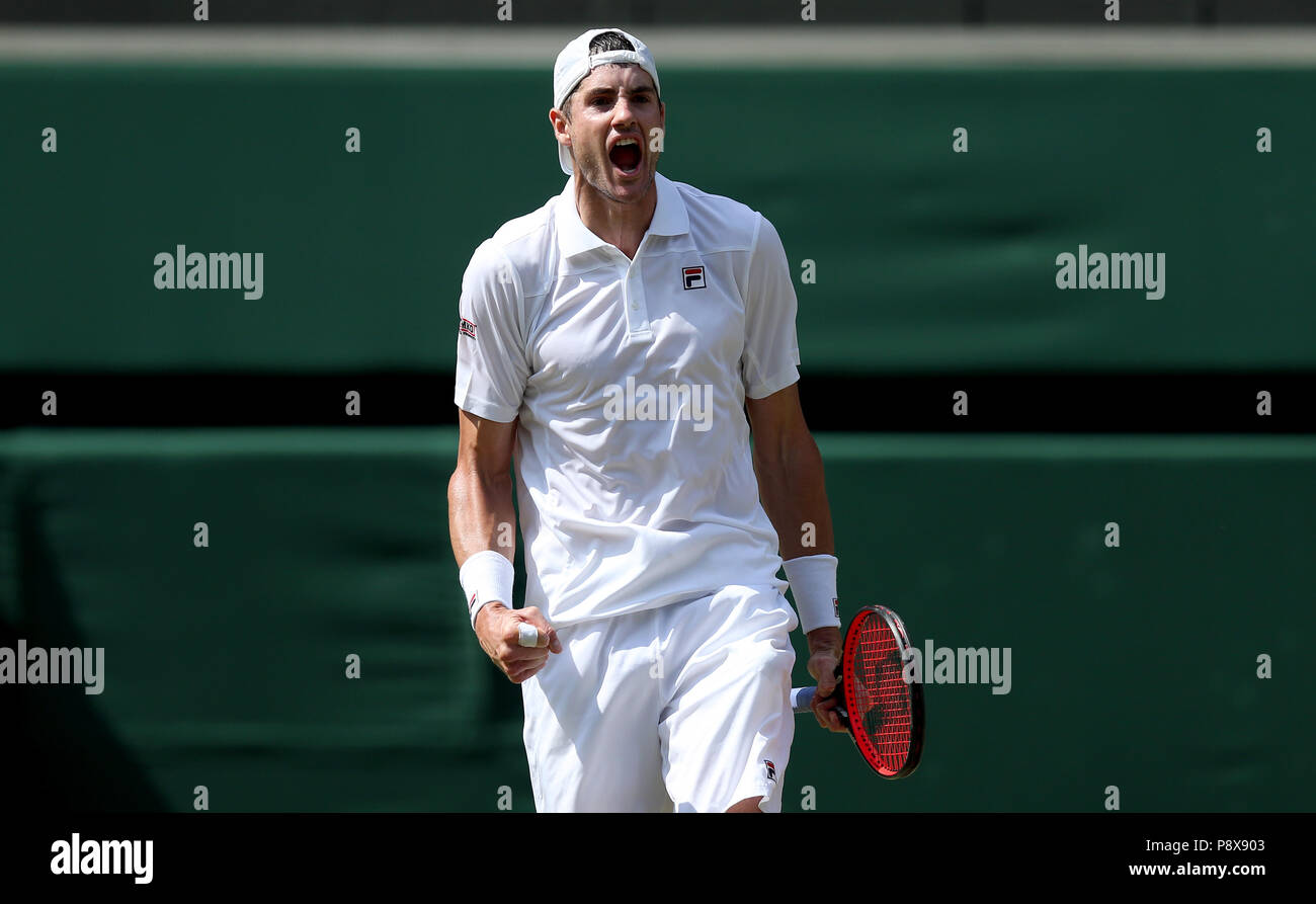 John Isner celebrates winning the second set on day eleven of the Wimbledon Championships at the All England Lawn Tennis and Croquet Club, Wimbledon. Stock Photo
