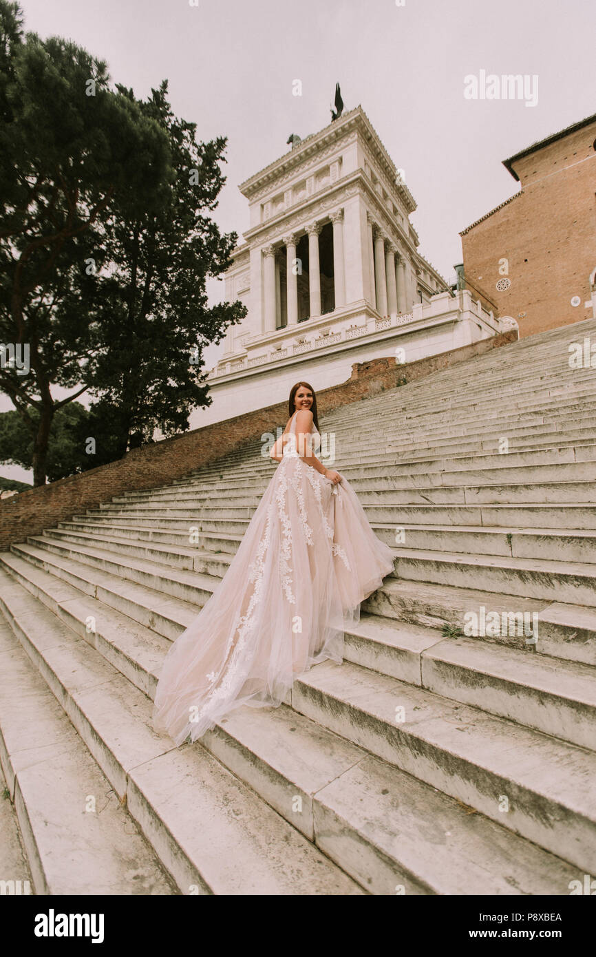 Bride in wedding dress on stairs of Cordonata Capitolina in Rome, Italy Stock Photo - Alamy Bride in wedding dress on stairs of Cordonata Capitolina in Rome, Italy Stock Photo - Alamy