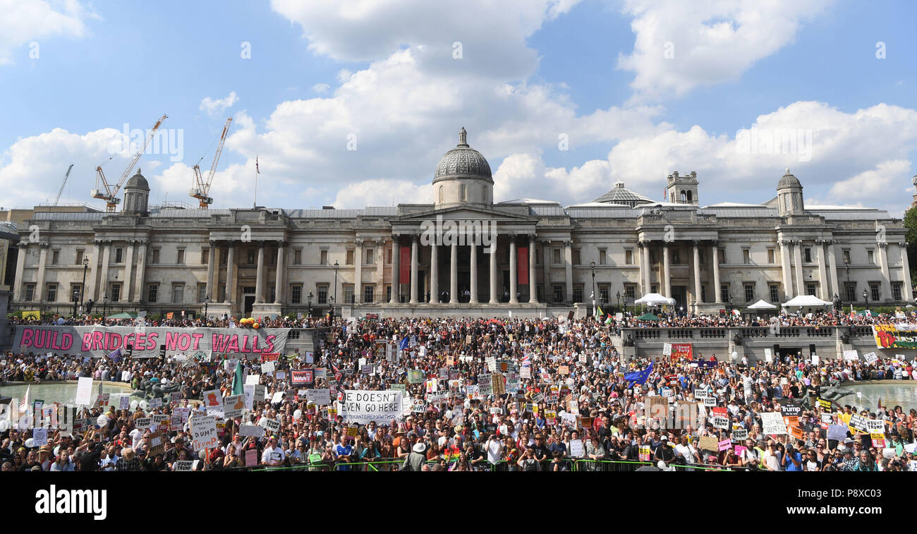 Demonstrators gather in Trafalgar Square, London during a 'Stop Trump' march as part of the protests against the visit of US President Donald Trump to the UK. Stock Photo