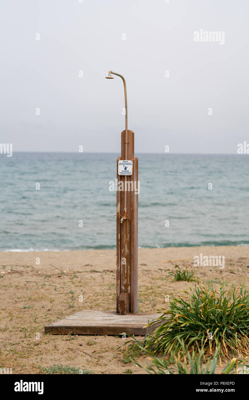 An isolated beach shower on a Cretan beach Stock Photo Alamy