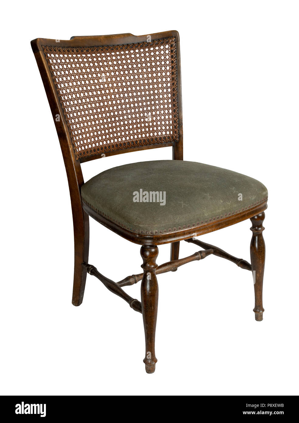 Retro wooden french cane back dining chair isolated on white background including clipping path Stock Photo