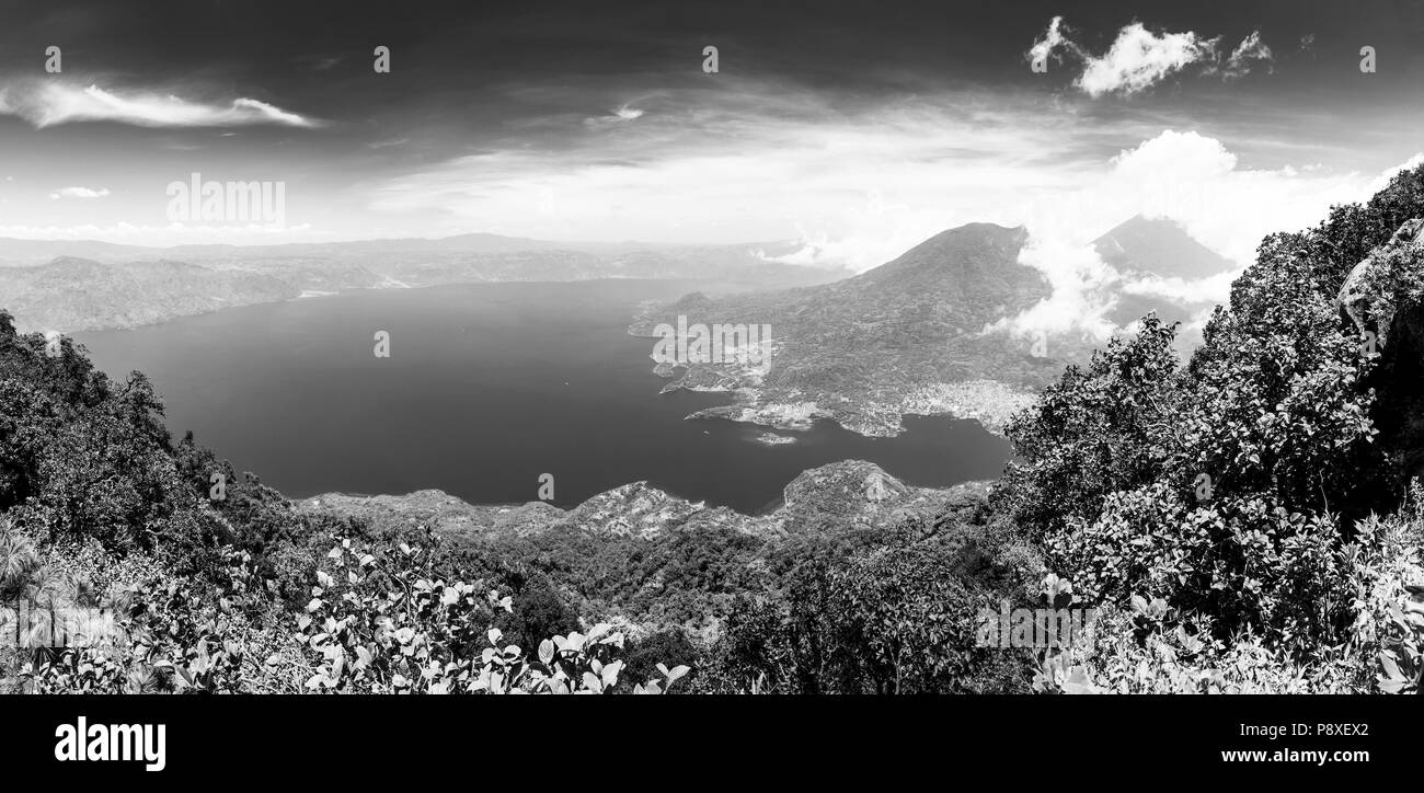 Panoramic view of Lake Atitlan from the summit of volcano San Pedro, Guatemala, Central America in black and white Stock Photo