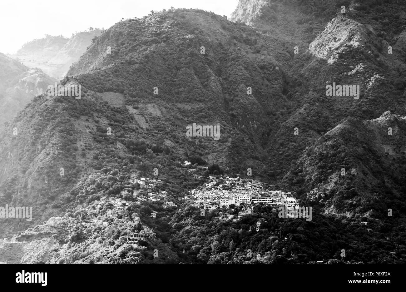 Sunset over Santa Cruz La Laguna on Lake Atitlan, Guatemala, Central America in black and white Stock Photo