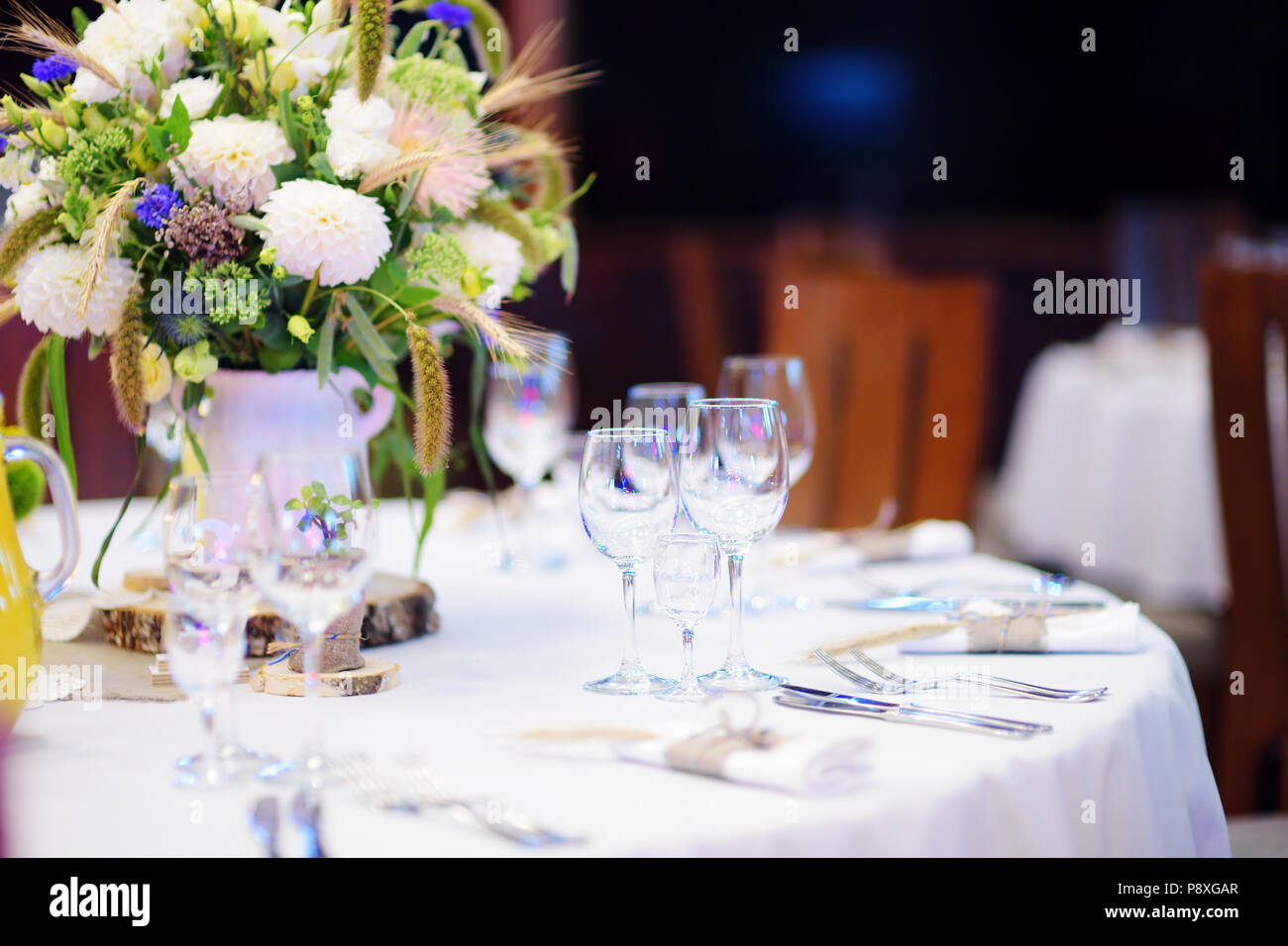 Beautiful table set for some festive event, party or wedding reception ...