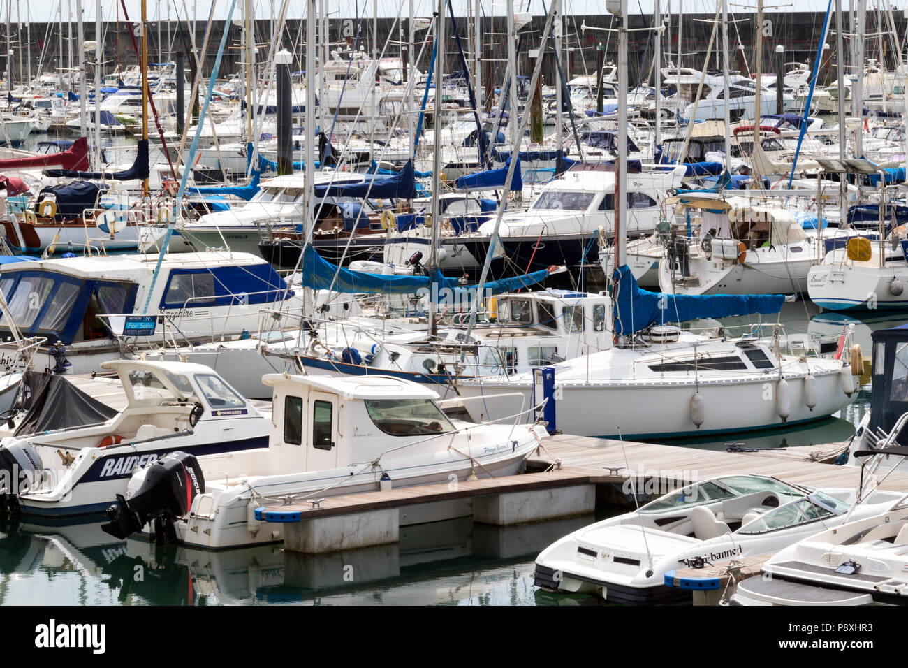 Luxury yachts berthed at Brighton Marina in East Sussex Stock Photo