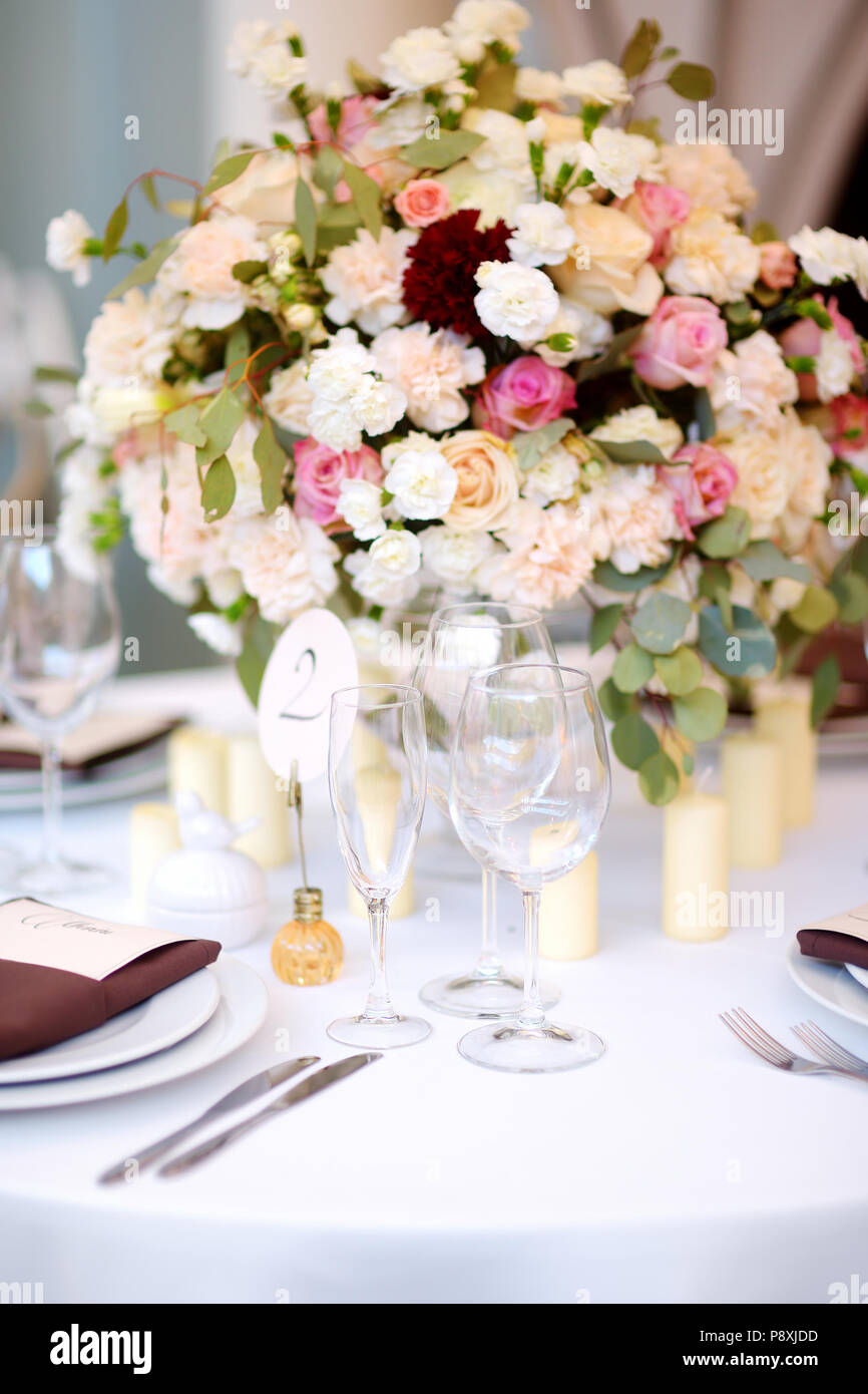 Beautiful table set for some festive event, party or wedding reception ...