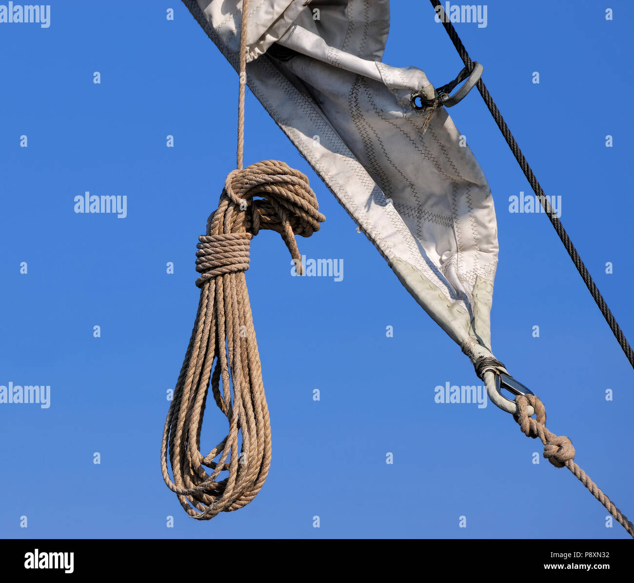 Coil of Rope Hanging from a Sail Stock Photo Alamy