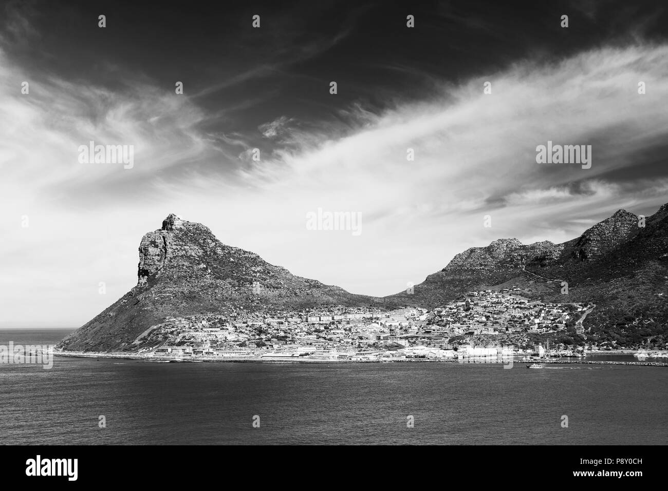 Sentinel peak in Hout Bay near Cape Town, South Africa in black and white Stock Photo