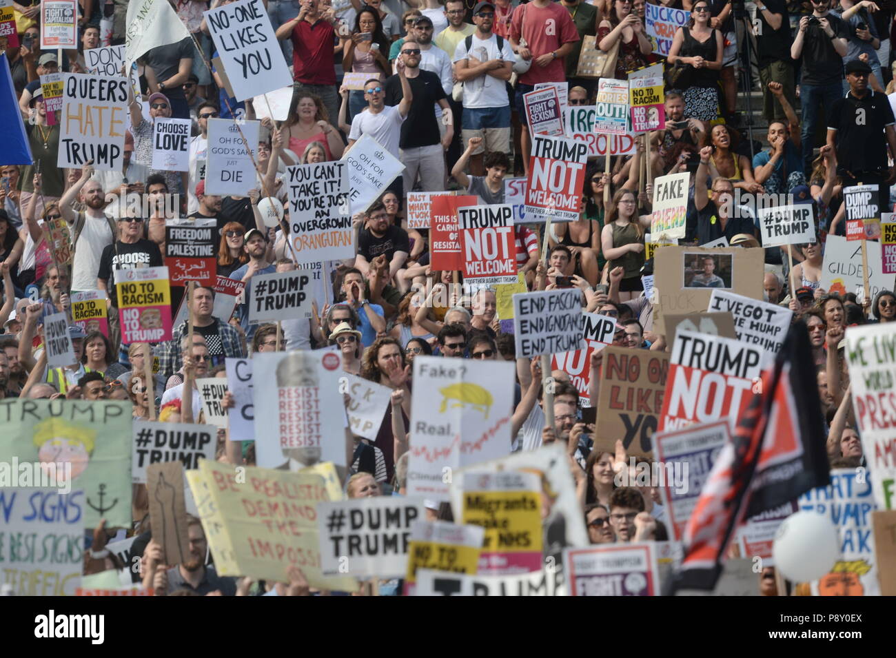 Demonstrators gather in Trafalgar Square, London during a 'Stop Trump' march as part of the protests against the visit of US President Donald Trump to the UK. Stock Photo