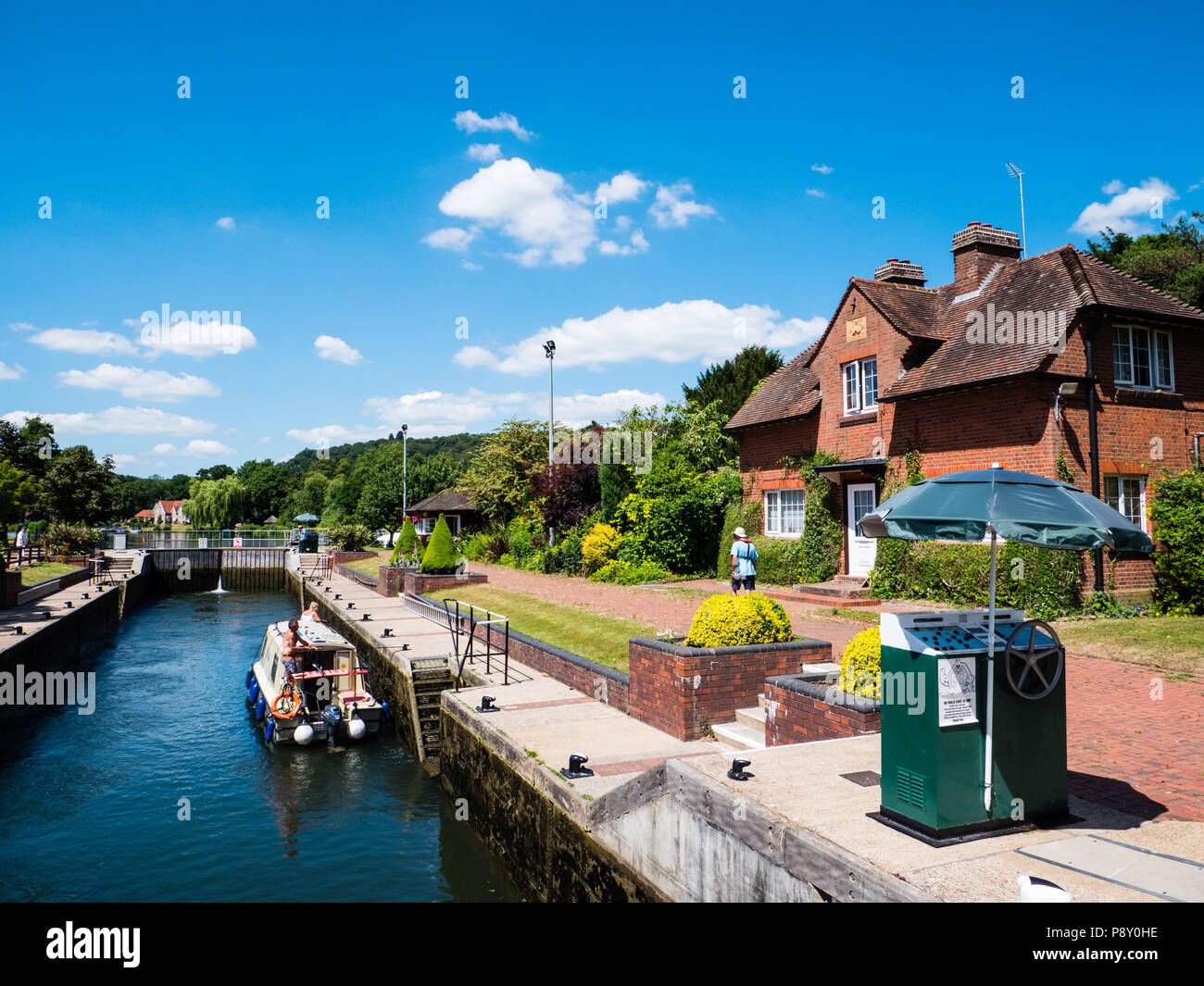 Quirky Boat Using, Hambleden Lock and Weir, River Thames, Berkshire, England, UK, GB. Stock Photo