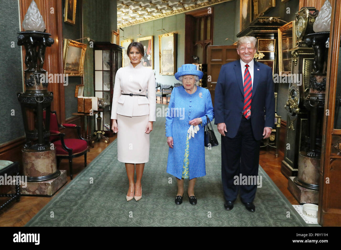 Queen Elizabeth II stands with US President Donald Trump and his wife