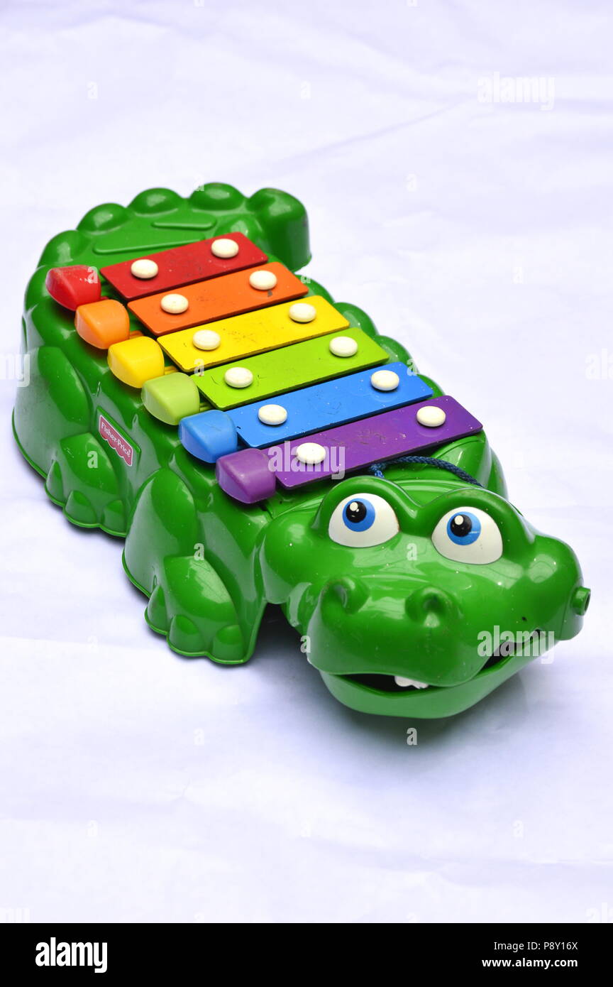 crocodile antique plastic toy fisher price brand Stock Photo Alamy