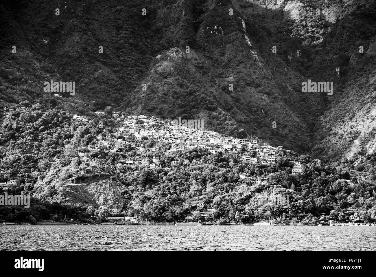 Town of Santa Cruz La Laguna on Lake Atitlan, Guatemala, Central America in black and white Stock Photo